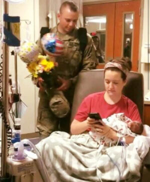 Soldier husband sneaks into hospital to surprise wife visiting preemie twins in NICU