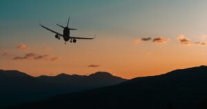Passengers describe ‘total pandemonium’ after plan dives to avoid collision