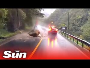 Quick-thinking driver dodges HUGE falling boulder on mountain road