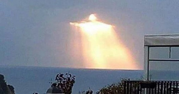 “Christ the Redeemer” Seen Radiating Light Through Clouds in Photo Taken by Man