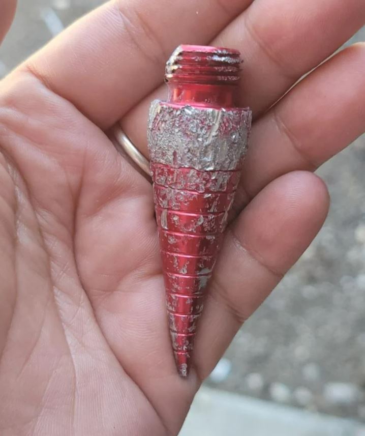 What Caused This Tire Puncture on a Quiet Residential Street?