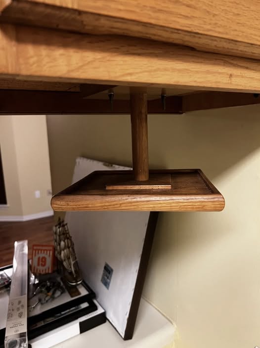 Spinning Wooden Square Hanging Under the Cabinet Near the Stove. What Is This?