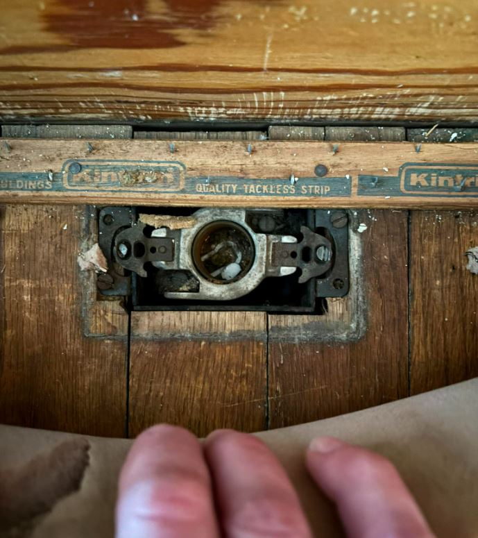 Found Under the Carpet: A Light Socket in the Floor?