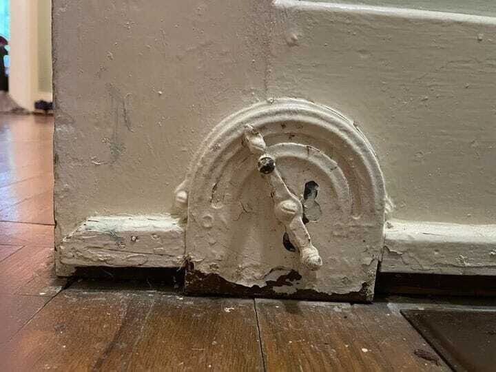 “This Is in Our Hallway — Painted Over and No Longer Functional… But What Was It For?”