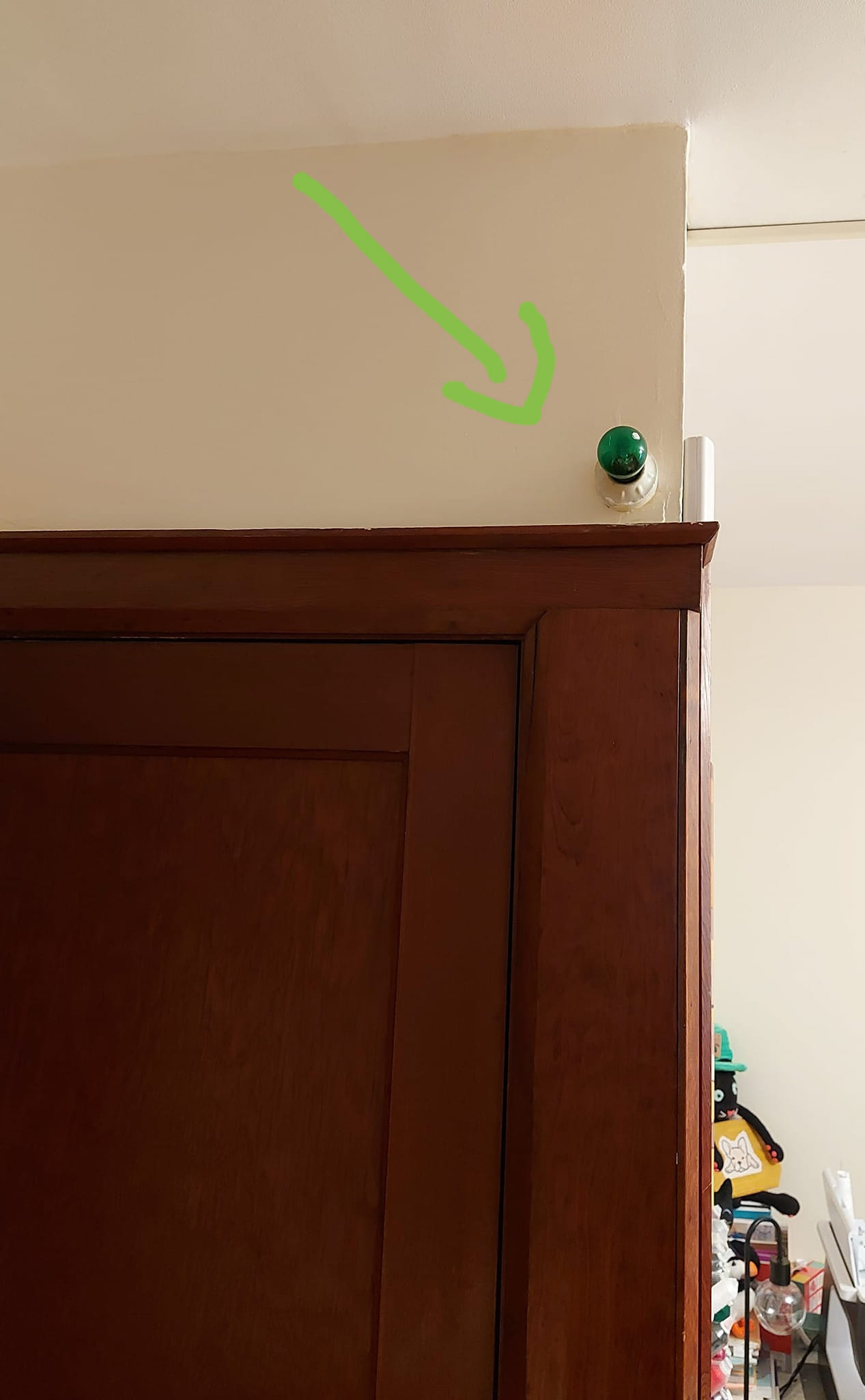 The Mystery of the Green Light Above the Basement Door