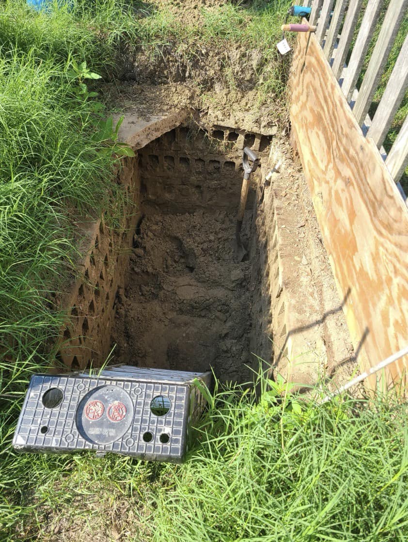 What is This Mysterious Pit in the Backyard? Uncovering the History Behind an Odd Feature