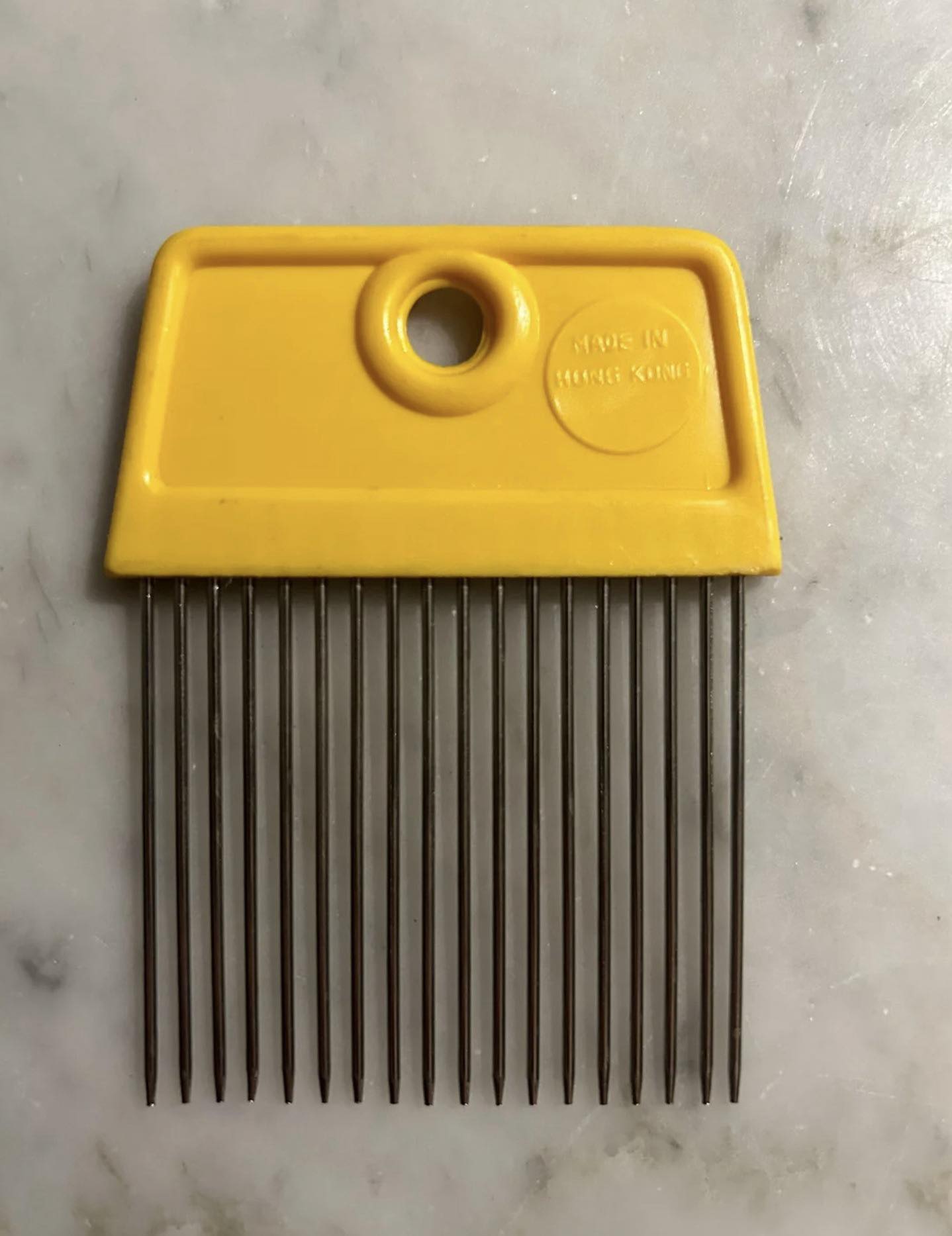What Is This? Solving the Mystery of the Small Yellow Comb-Like Item with Metal Prongs