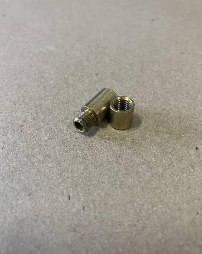 Mystery Object Found: Small Brass Capsule Appears in Teen’s Laundry After Weekend Away