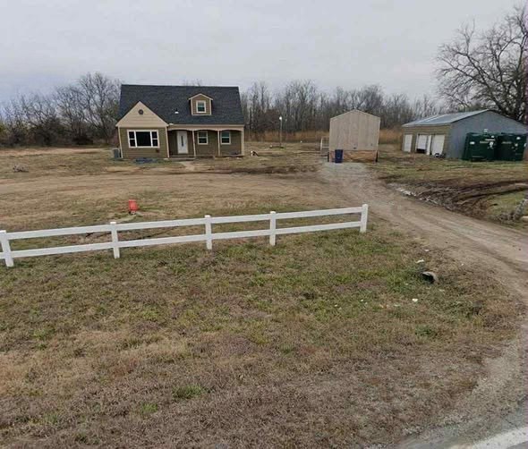 Hidden Gem in Augusta, KS: 4-Bedroom, 3-Bath Home on 4.2 Acres with 3-Car Garage – Endless Potential Awaits