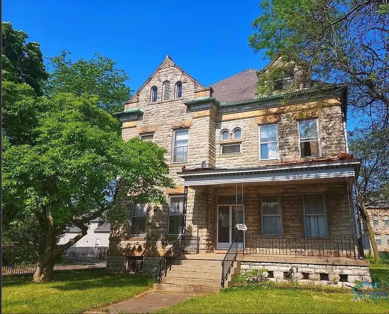 $69,900! Eight bedrooms and four bathrooms! Almost two acres in Ohio.