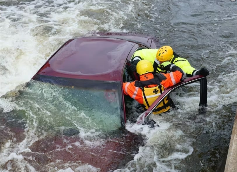 Family found in car in river they were with their m…See details