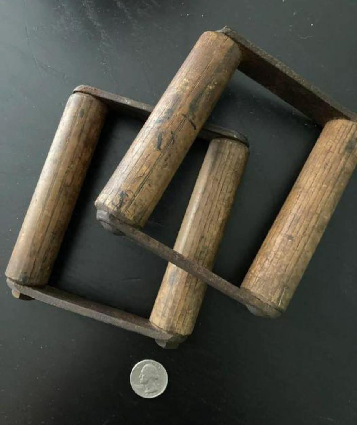 Found these at a flea market. The metal pieces are riveted on. Any idea what these were used for?