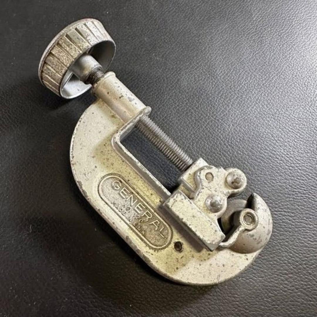 My sister wants to know what this aluminium object is. Such an unusual handle