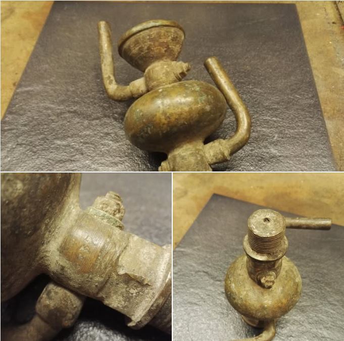   Brass/bronze water spigot looking thing with letters and numbers. Anyone recognize it?